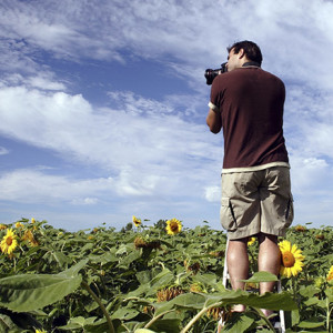 Most photos are taken in a standing position at eye height. For a different look, try climbing a ladder or lying down on the ground.
